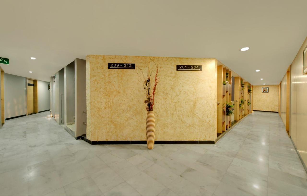 Central Beacon Hotel Сурат Экстерьер фото